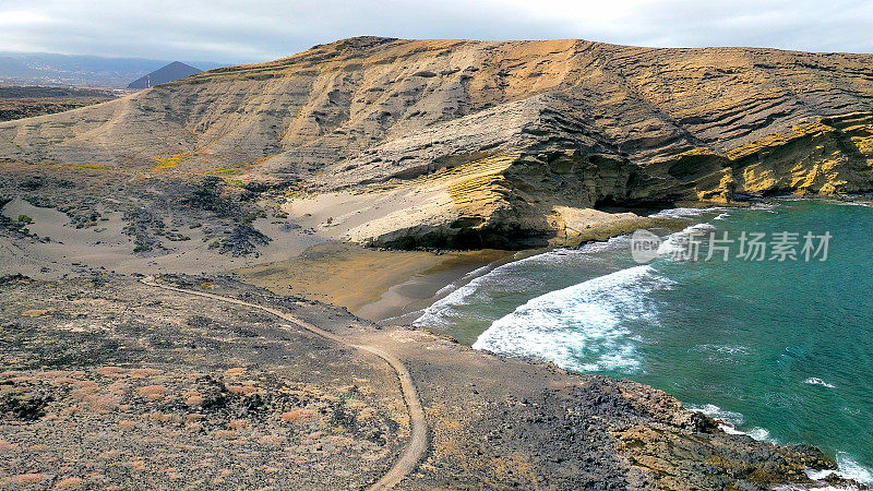 Aerial view of "Pelada" beach at the natural reserve of "Monta?a Pelada" in Tenerife (Canary Islands). Drone shot